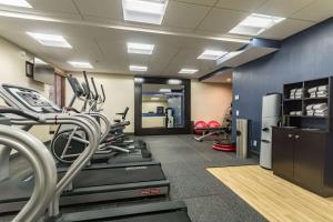 a gym with treadmills and elliptical machines at Hampton Inn Winchester-University/ Mall in Winchester