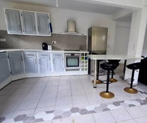 Kuchyň nebo kuchyňský kout v ubytování L'Escale du Plaisir