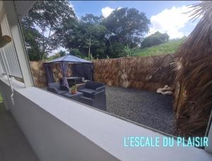 Zahrada ubytování L'Escale du Plaisir + 7 fotografií