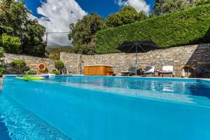 The swimming pool at or close to Akrolithos Villa, Milies Pelion