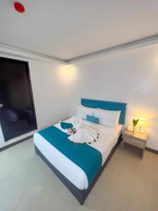 Postel nebo postele na pokoji v ubytování Boracay Sea View Hotel