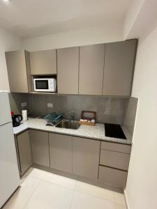 Departamento céntrico y espacioso en Río Cuarto II的厨房或小厨房