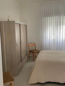 Departamento céntrico y espacioso en Río Cuarto II客房内的一张或多张床位