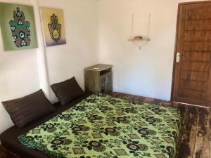 Postel nebo postele na pokoji v ubytování Easy Bungalow