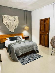 Cama o camas de una habitación en TARA TARA Hotel