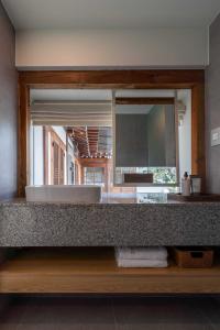 a bathroom with a sink and a mirror at Luxury hanok with private bathtub - SN16 in Seoul
