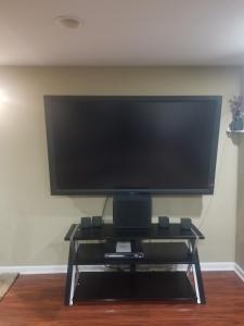 TV o dispositivi per l'intrattenimento presso Quiet and spacious Room1
