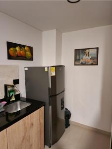 Virtuvė arba virtuvėlė apgyvendinimo įstaigoje Apartamento edificio Castellana