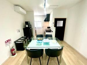 Kuchyň nebo kuchyňský kout v ubytování guesthouse Nakatsu
