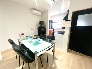 Kuchyň nebo kuchyňský kout v ubytování guesthouse Nakatsu