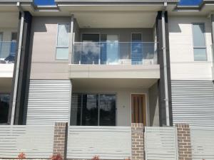 a large white house with a balcony on it at Kincaid@234 in Wagga Wagga