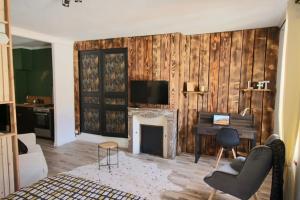 TV a/nebo společenská místnost v ubytování Appartement cosy hyper centre