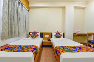 Fotografie z fotogalerie ubytování FabHotel Prime Grand Unity, Changodar v destinaci Ahmadábád