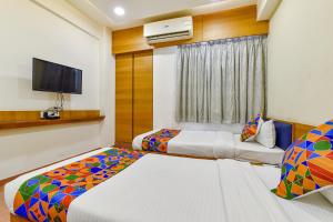 Fotografie z fotogalerie ubytování FabHotel Prime Grand Unity, Changodar v destinaci Ahmadábád