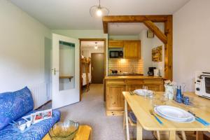 Kuchyňa alebo kuchynka v ubytovaní Appartement Plein Nature - Combloux - Happy Rentals