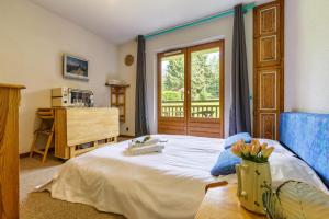 Posteľ alebo postele v izbe v ubytovaní Appartement Plein Nature - Combloux - Happy Rentals