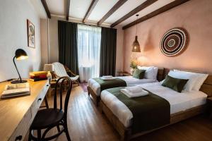 Rúm í herbergi á Hameau Mukhrani