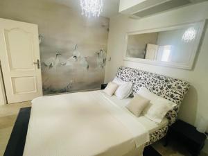 Postel nebo postele na pokoji v ubytování Apartments St Stefan