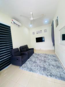 Μια τηλεόραση ή/και κέντρο ψυχαγωγίας στο Homestay D’Solehah Kuala Terengganu