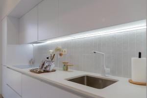 A kitchen or kitchenette at Primera Línea de Playa - MÁLAGA