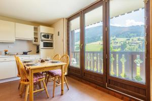 Kuchyňa alebo kuchynka v ubytovaní View Sur Arly E10 - Happy Rentals