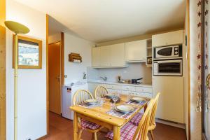 Kuchyňa alebo kuchynka v ubytovaní View Sur Arly E10 - Happy Rentals