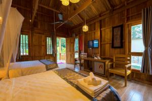 TV a/nebo společenská místnost v ubytování Phu Quoc Island Lodge
