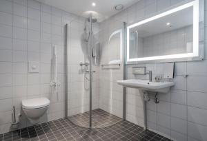 Koupelna v ubytování Thon Hotel Lofoten + 37 fotografií