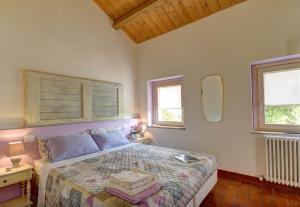 Postel nebo postele na pokoji v ubytování B&B Campodisole