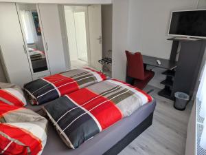 TV a/nebo společenská místnost v ubytování Föller´s Gästehaus