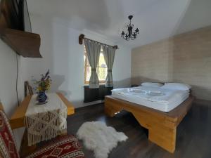 Postel nebo postele na pokoji v ubytování Mosia Dar In Rai