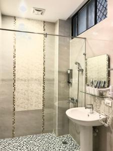 Un baño de 小小鋼琴家民宿&文創旁地點讚市中心 37 fotos más
