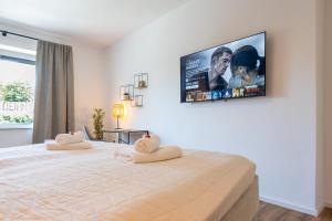 Postel nebo postele na pokoji v ubytování Super zentral I Frisch renoviert