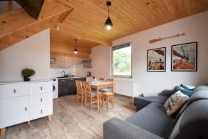 Kuchyň nebo kuchyňský kout v ubytování Redwood Mielno