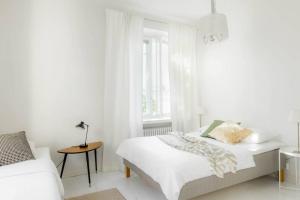 Postel nebo postele na pokoji v ubytování Airy and Bright one-Bedroom apt