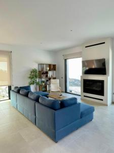 Posezení v ubytování Vivienda en Granada, Cortijo Balcón Cotobro, Almuñécar, Casa con piscina y vistas increíbles