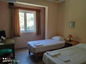 Krevet ili kreveti u jedinici u objektu Seaside villa in Eretria