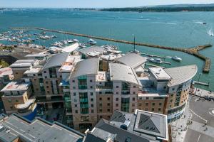 an aerial view of a building with a marina at Panorama in Poole