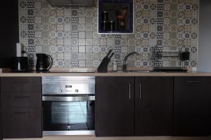 Kuchyň nebo kuchyňský kout v ubytování Apartment Isabel
