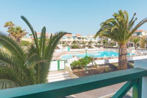 a view of the pool from the balcony of a resort at Casa MiraMar - Las Torres del Castillo in Costa de Antigua