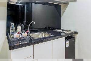 Köök või kööginurk majutusasutuses O2 Hotel Maesot