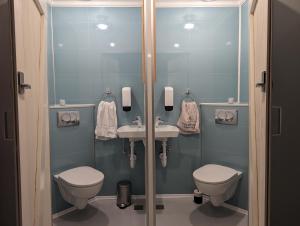 Ein Badezimmer in der Unterkunft Vík Hostel