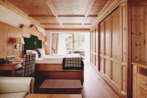 Posteľ alebo postele v izbe v ubytovaní Burg Hotel Oberlech
