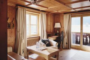 Posteľ alebo postele v izbe v ubytovaní Burg Hotel Oberlech