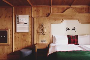 Posteľ alebo postele v izbe v ubytovaní Burg Hotel Oberlech
