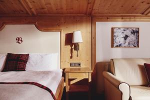 Posteľ alebo postele v izbe v ubytovaní Burg Hotel Oberlech