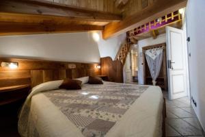 Postel nebo postele na pokoji v ubytování B&B Lo Tatà