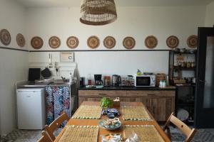 A kitchen or kitchenette at B&b Boblin blu