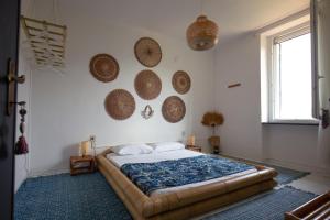 A bed or beds in a room at B&b Boblin blu