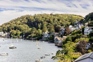 a view of a river with boats on it at Gothic Cottage in Dartmouth